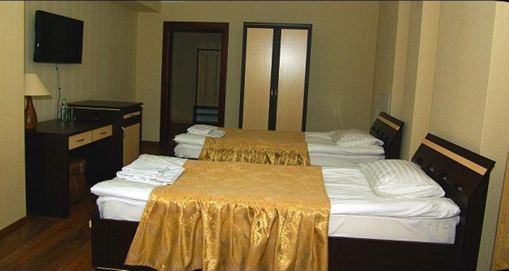Hotel Deluxe Horodenka Cameră foto